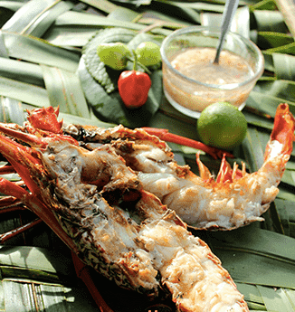 Langouste barbecue tradition cuisine antillaise